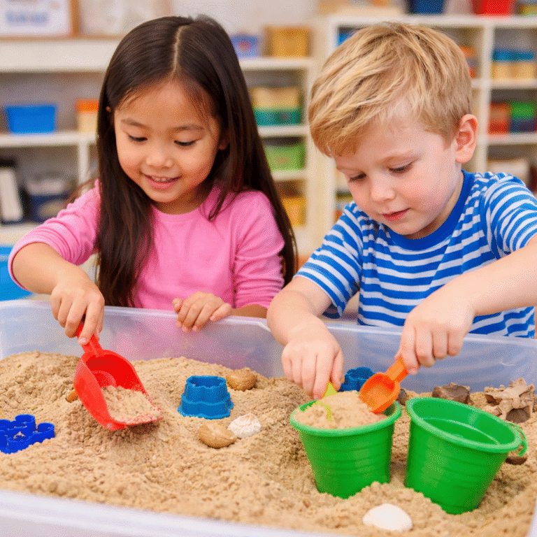 Preschoolers playing in a sensory bin, exploring textures with their hands
