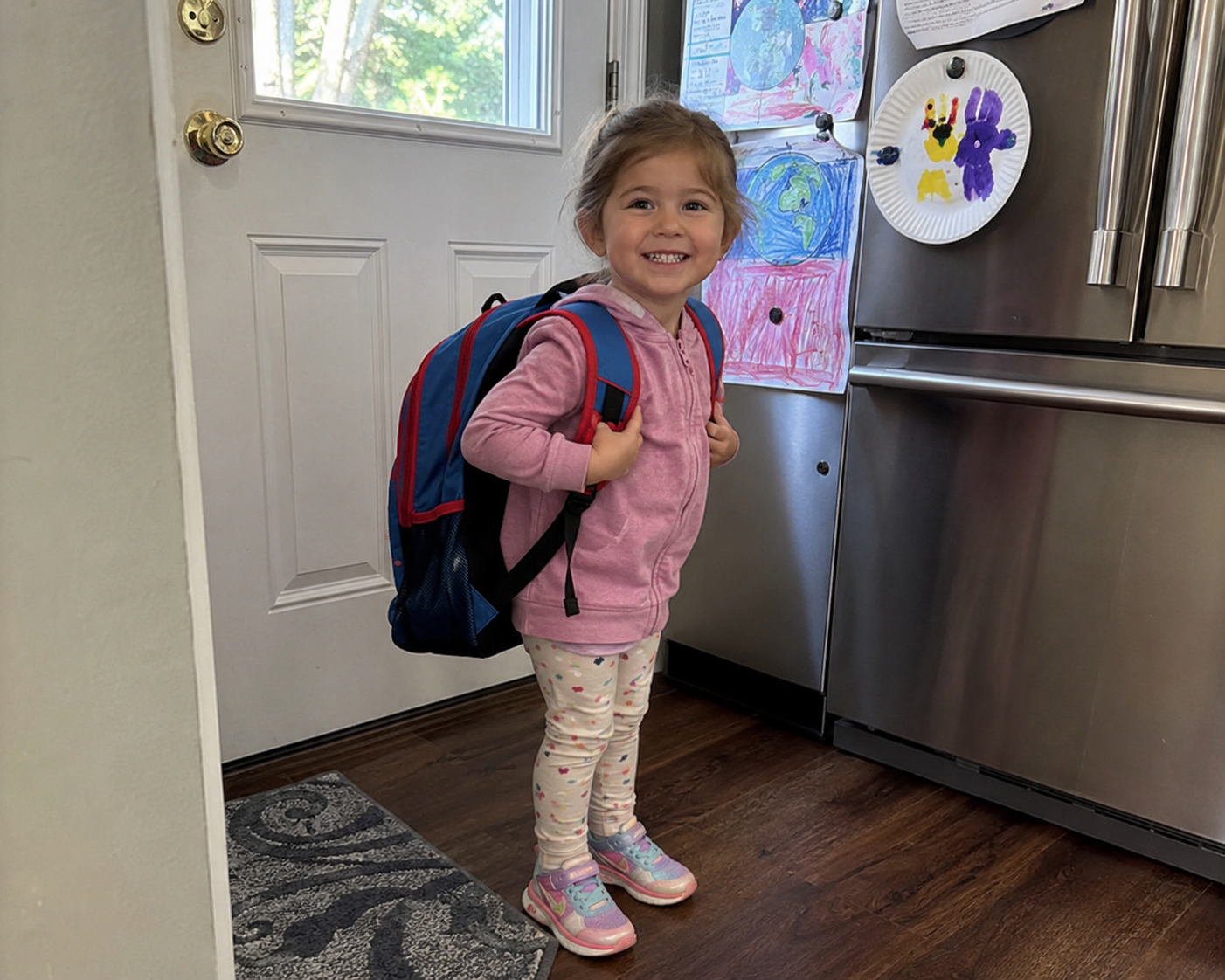 Preschool child wearing a backpack, ready for back to school readiness